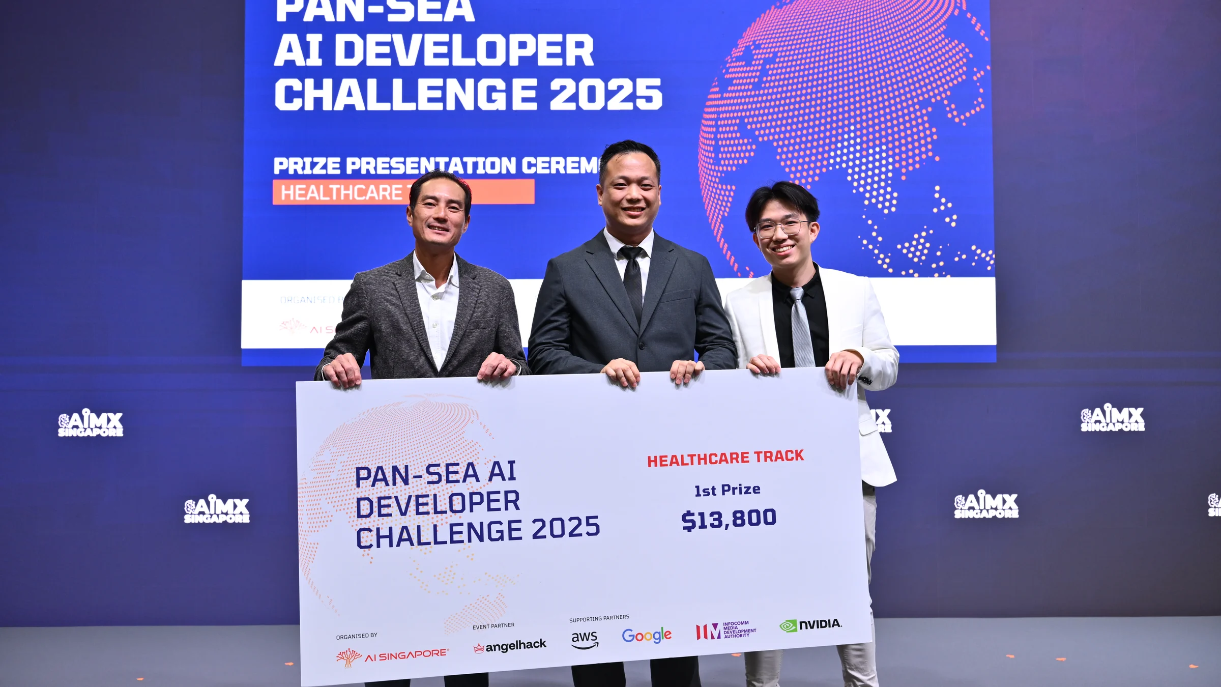 The SIMIS founders holding the first-prize cheque at the AI Singapore Pan-SEA AI Developer Challenge 2025 prize ceremony